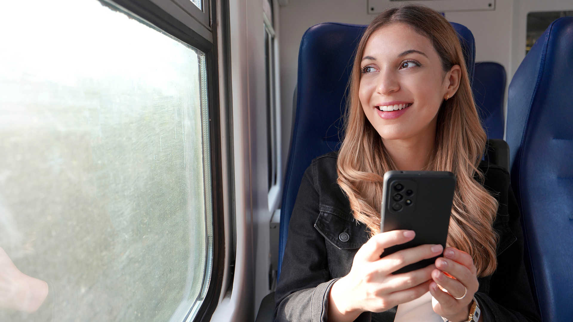 Woman inside a bus enjoying the benefits of smart city mobility