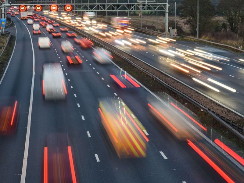 smart-radar-banner 8 lanes of traffic driving towards and away with lights on