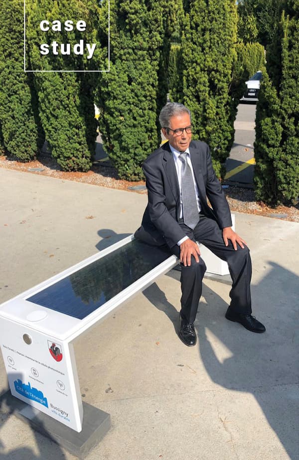Man sitting on a Smart Bench with Case Study heading
