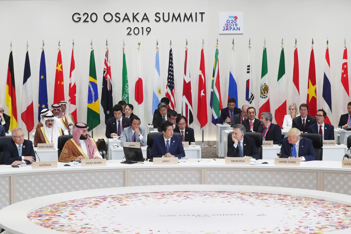 Summit meeting of international leaders and their national flags